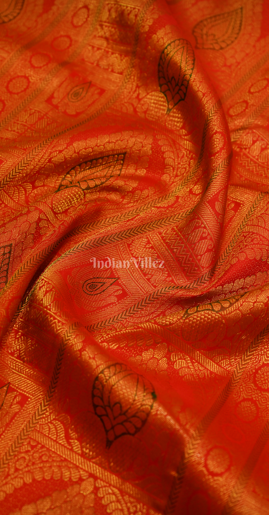 Title
Exclusive Orange Red Lotus Motif Brocade Pure Kanjivaram Silk Saree