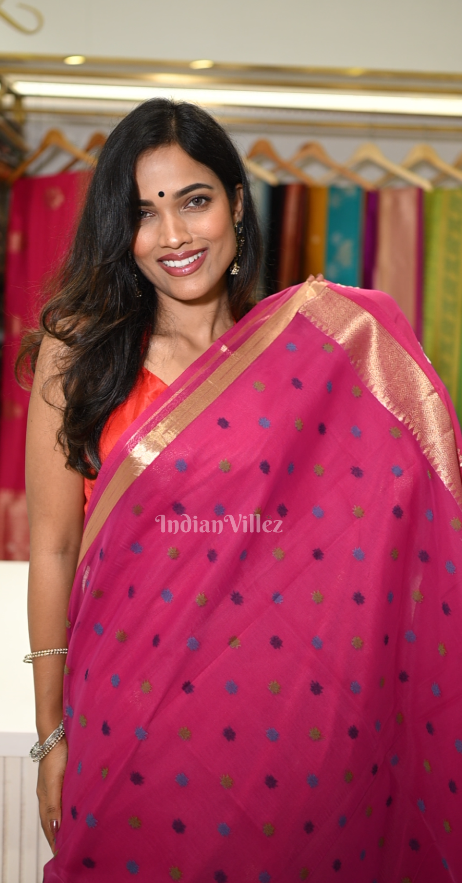 Rani Pink Linen Saree with Blue Zari Floral Pallu 