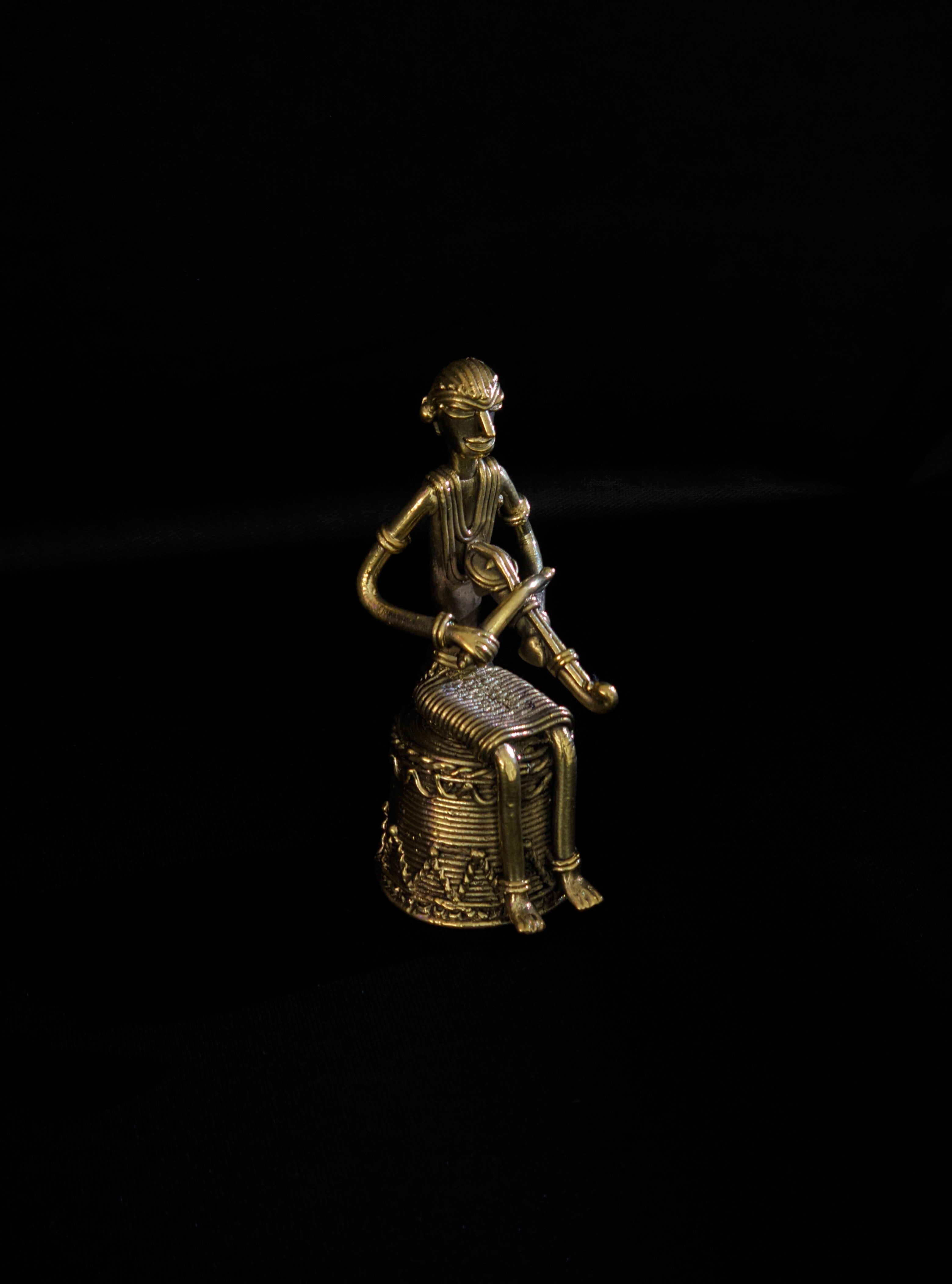 Dhokra - Tribal Musician sitting on base playing Kendra(1 PICES)