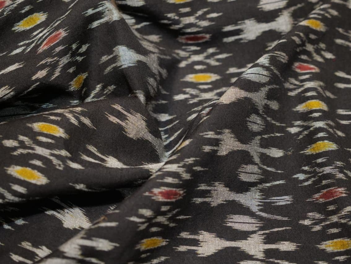 White Tribal on Black with Red & Yellow Motif Cotton Ikat Handloom Fabric - IndianVillèz